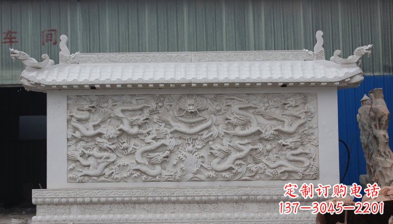 淄博九龙壁石雕塑——让礼堂充满豪华气息