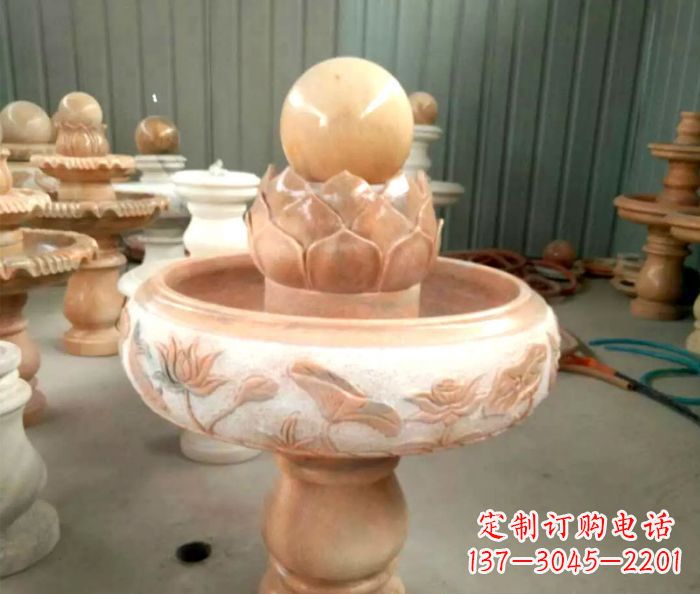 淄博石来运转晚霞红风水球喷泉石雕