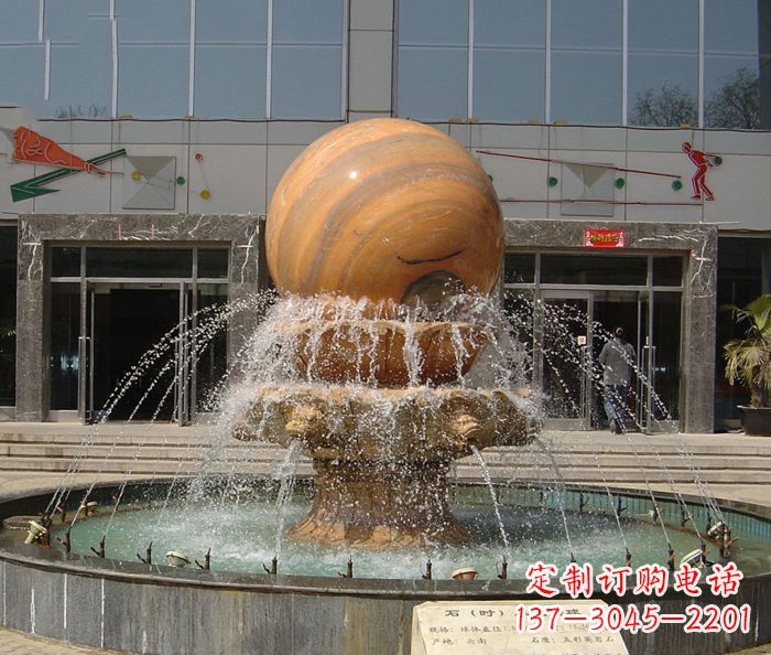 淄博石来运转球晚霞红风水球石雕