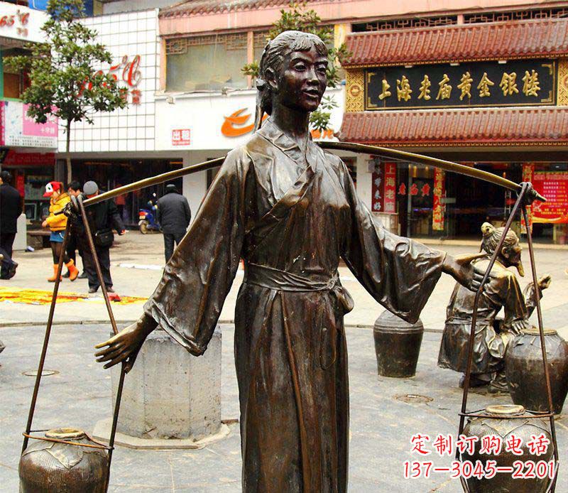 淄博挑着罐子的古代女人铜雕