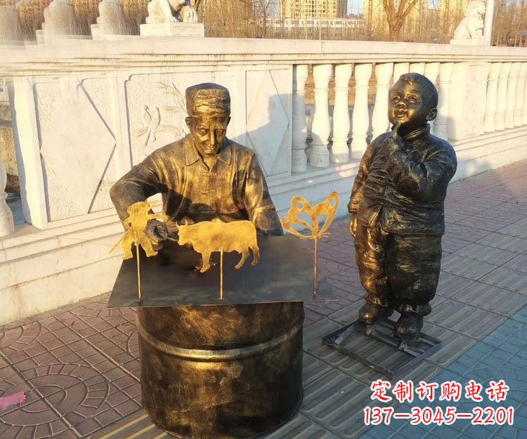 淄博铜雕画糖人的人物