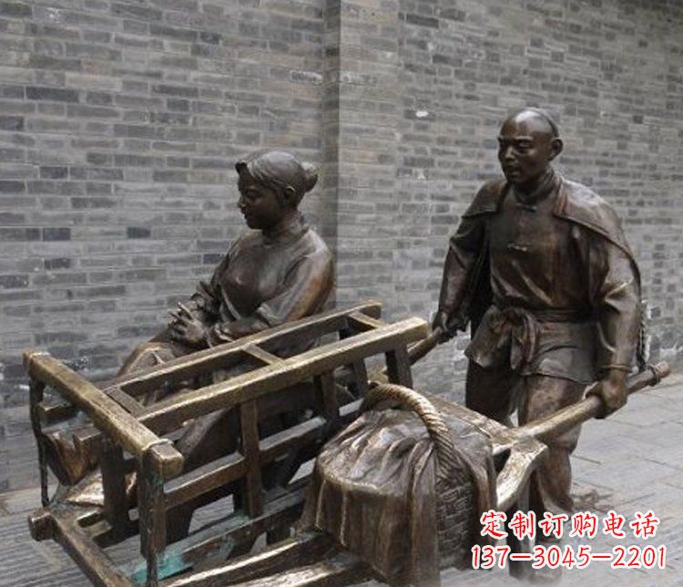 淄博推独轮车的人物铜雕