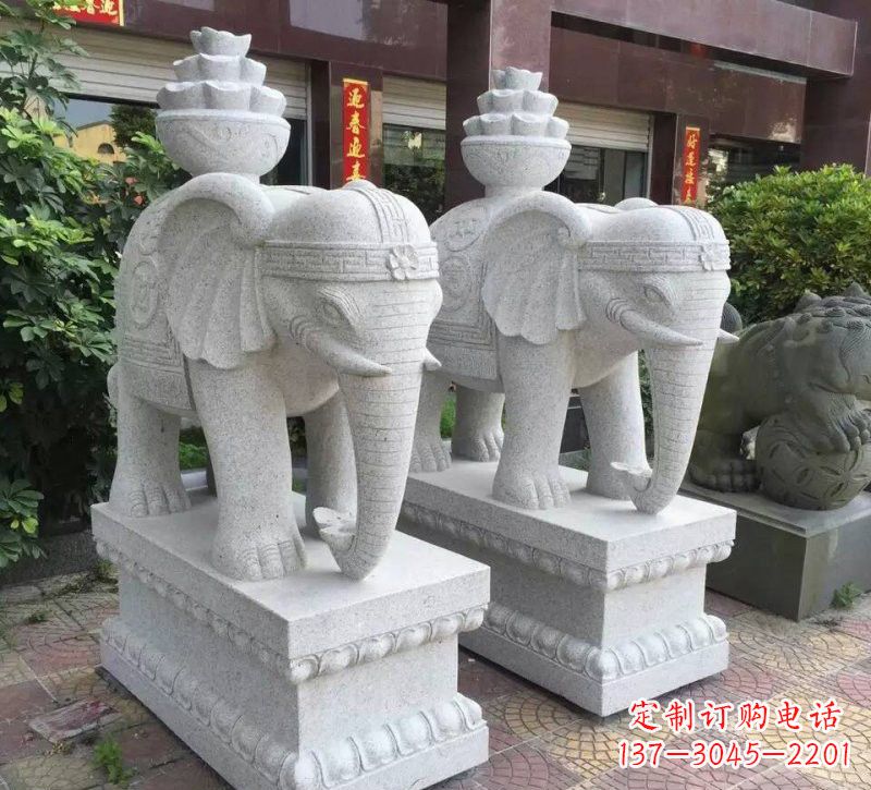 淄博驮元宝的大象石雕