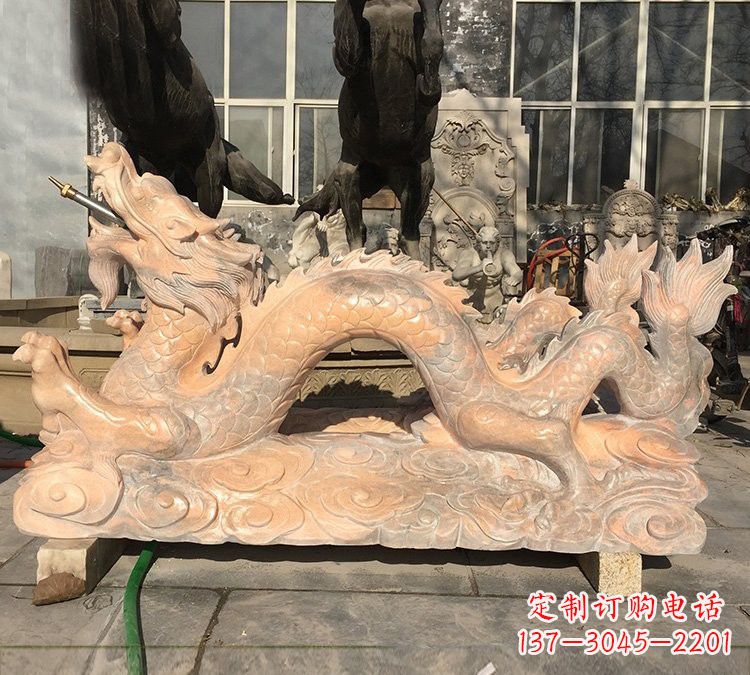 淄博晚霞红石雕喷水龙
